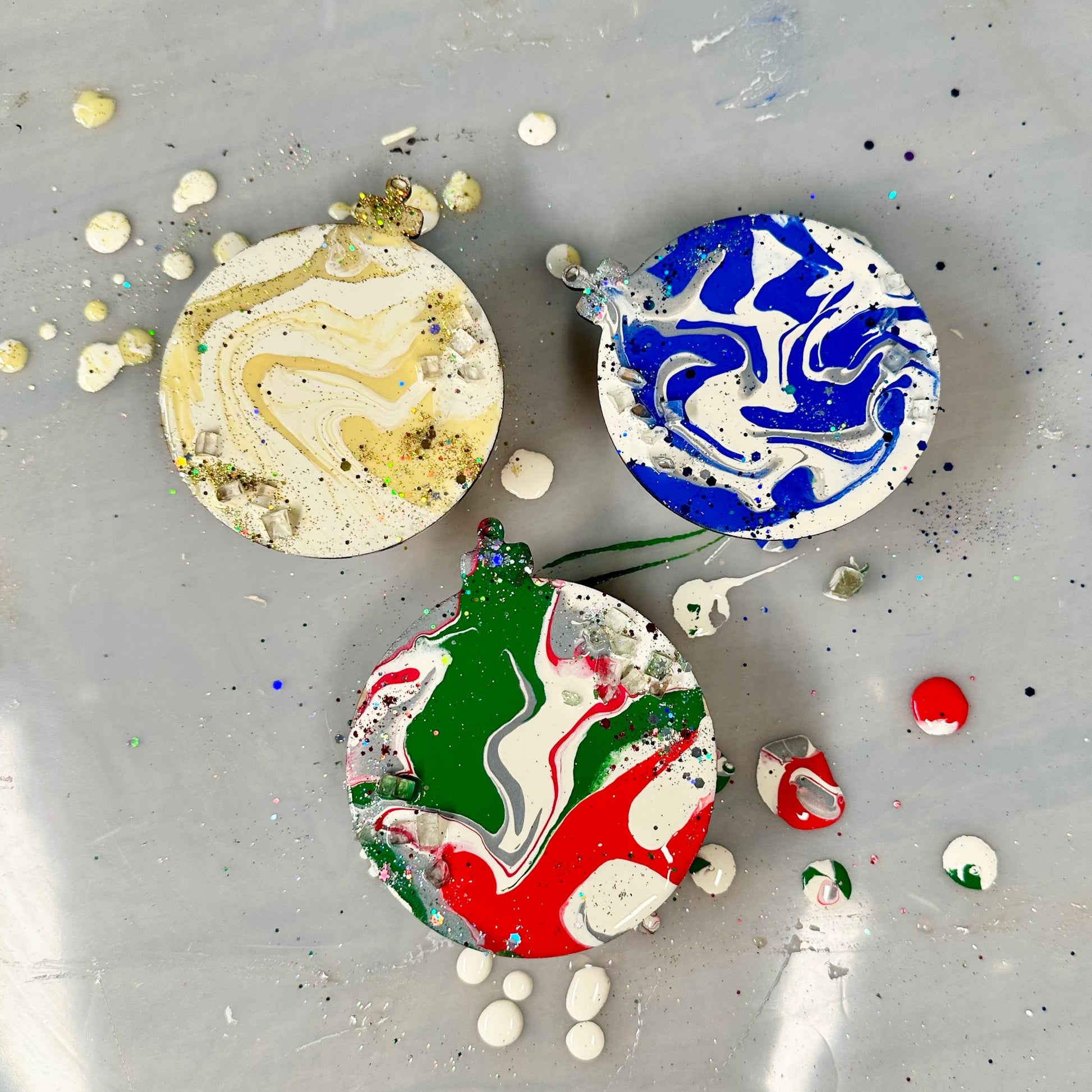 Colorful marbled ornaments on a tray