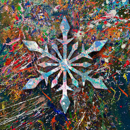 Wooden cutout of a splatter painted snowflake on a colorful wall.